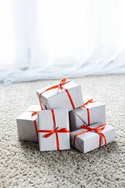 Gifts. Beautiful boxes with gifts. Gifts with red ribbon. Christmas. New Year. Valentine\'s Day.