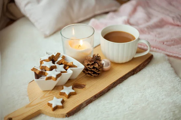 Christmas cookies stars, cocoa on a wooden board. Christmas decor, candles, plaid. — Stock Photo, Image