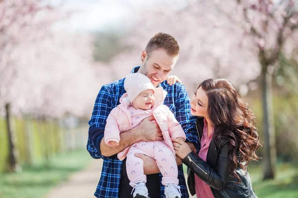 Young Parents Holding Arms Small Pretty Daughter Beautiful Family Flowered — Stock Photo, Image