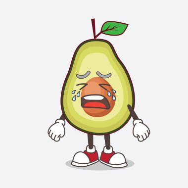 Ağlayan ifadeli Avokado Fruit çizgi film maskotu karakteri.