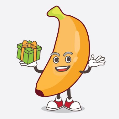 Muz Fruit çizgi film karakterinin bir çizimi. Bir kutu hediyeyle birlikte.