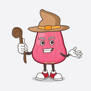 Cava Apple karikatür karakterinin sahnede bir cadı olarak bir resmi.