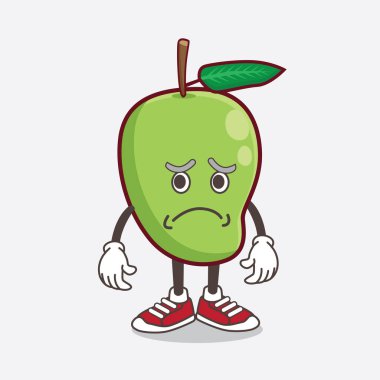 Mango Fruit çizgi film maskotu karakterinin korku dolu bir yüzü var.