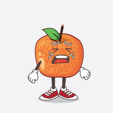 Ağlayan ifadeli bir Fluots Fruit çizgi film maskotu karakteri.