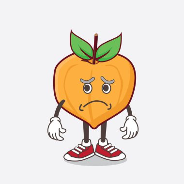 Yumurta meyvesi çizgi film maskotu karakterinin korkmuş bir yüzü var.