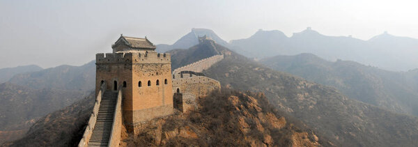 The Great Wall of China. This section of the Great Wall is Jinshanling, a wild part with scenic views. The Great Wall of China near Beijing. Wild Great Wall of China, Jinshanling, Beijing, UNESCO site
