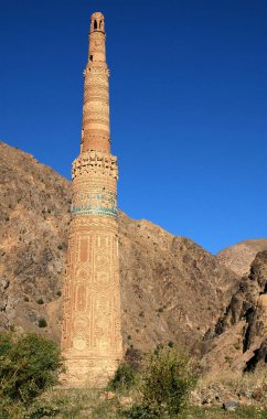 Minaret of Jam, Ghor Province in Afghanistan. The Jam minaret is a UNESCO site in a remote part of Central Afghanistan. The Minaret of Jam is an outstanding example of ancient Islamic architecture. clipart