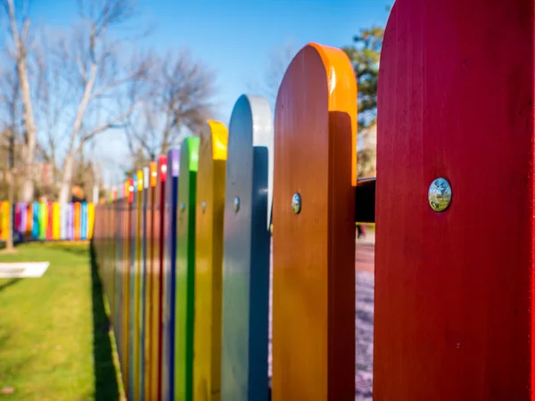 Wooden Fence Painted Different Colors Colored Fence Green Grass Blue — Stock Photo, Image