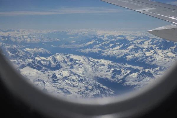 Snow Covered Mountains Alps Clouds Seen Window Aircraft — Stock Photo, Image