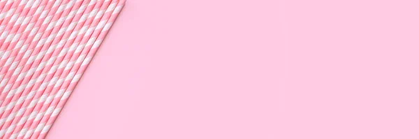 Straws on pink background banner