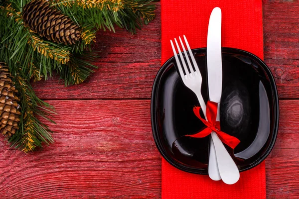 Christmas Table Place Setting Red Napkin Black Plate White Fork — Stock Photo, Image