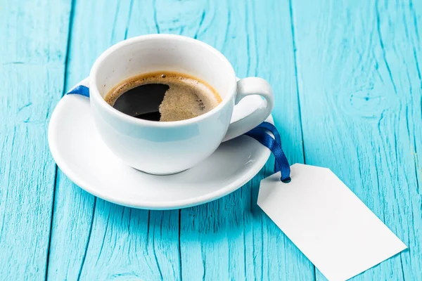 Cup Coffee Blank Card Blue Ribbon Wooden Table — Stock Photo, Image
