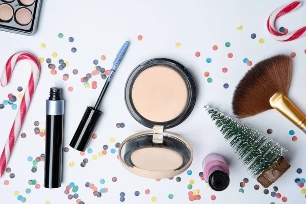 Picture on top of eye shadows, brushes, sugar cane ,nail polish on empty white table — Stock Image Picture Top Eye Shadows Brushes Sugar Cane Nail Polish Empty Stock Image