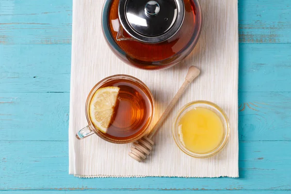 Glass Cup Tea Lemon Glass Teapot Honey Blue Wooden Table — Stock Photo, Image