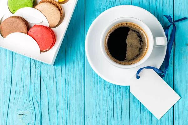 Photo Macaroon Coffee Blue Table Blank Paper Words — Stock Photo, Image