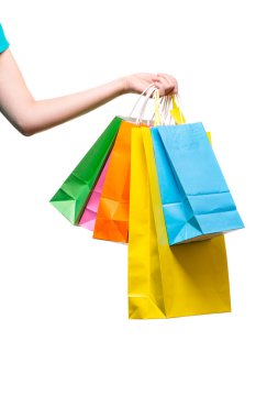 Alışveriş torbası taşıyan kadın elleri. Beyaz arkaplanda izole
