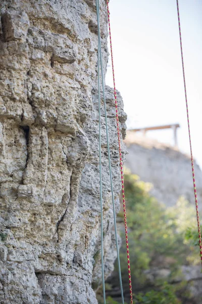 Photo of mountain for climbing and ropes on summer day