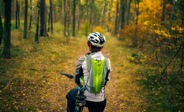 Image Back Sports Woman Helmet Bicycle Autumn Forest — Stock Photo, Image