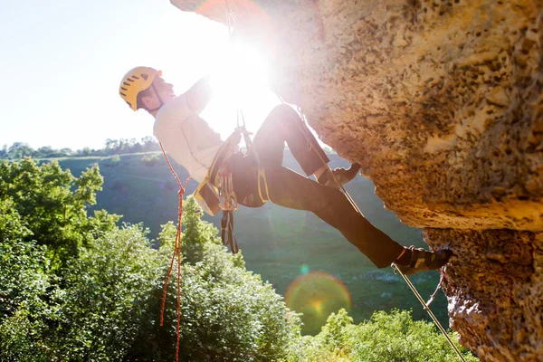 Image Man Climber Helmet Clambering Cliff Sunflare Effect Royalty Free Stock Photos