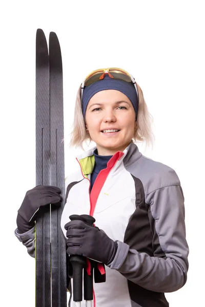 Foto de una joven deportista con esquís sobre fondo blanco vacío . — Foto de Stock
