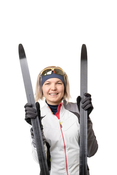 Photo of young sportswoman with skis on empty white background. — Stock Photo, Image