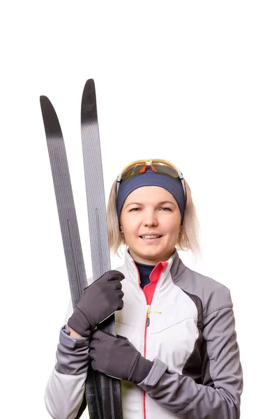 Photo of young sportswoman with skis on empty white background. — Stock Photo, Image