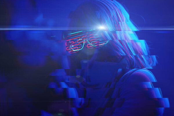 Girl with blaster in the futuristic battle. Concept virtual reality, cyber game. Image with glitch effect.