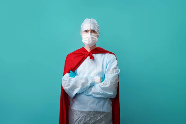 Doctor wearing surgical face mask in superhero cape. — Stock Photo, Image