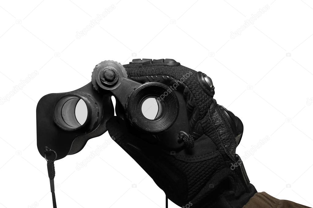 Isolated soldier arm holding binoculars.