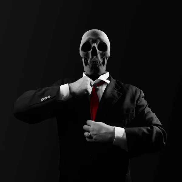 Politician with skull. — Stock Photo, Image