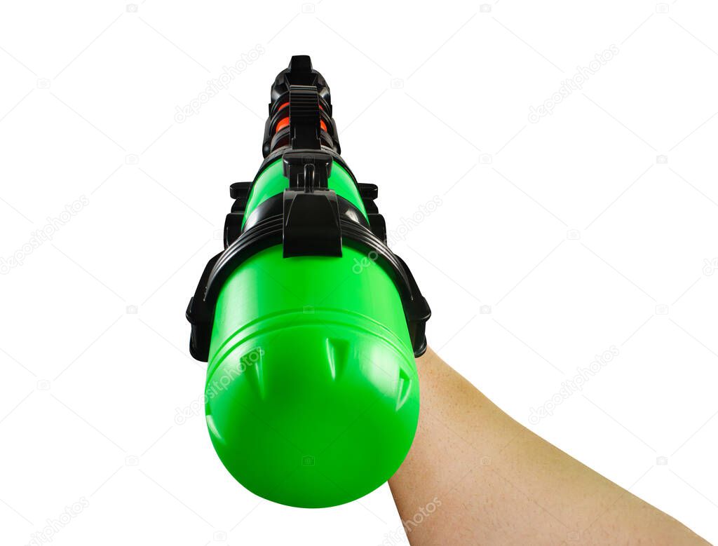 Isolated photo of hand holding a plastic multi-colored water pistol on white background first person view.