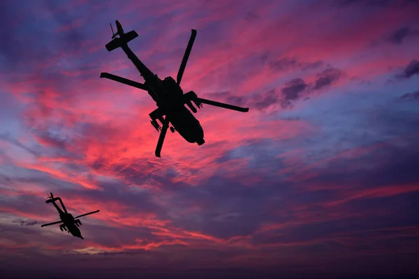 Boeing AH-64 Apaçi, kuyruk tekerleği tipi iniş takımları ve iki kişilik mürettebatı olan bir çift turbo saldırı helikopteri..