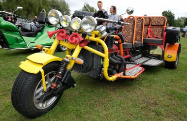 Extrem hand made moto tribike with lights and multiple seat at joyast show.
