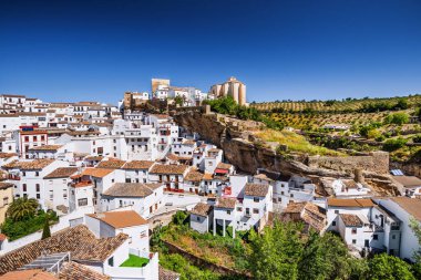 View of Setenil de las Bodegas village, one of the beautiful white villages (Pueblos Blancos) of Andalusia, Spain clipart