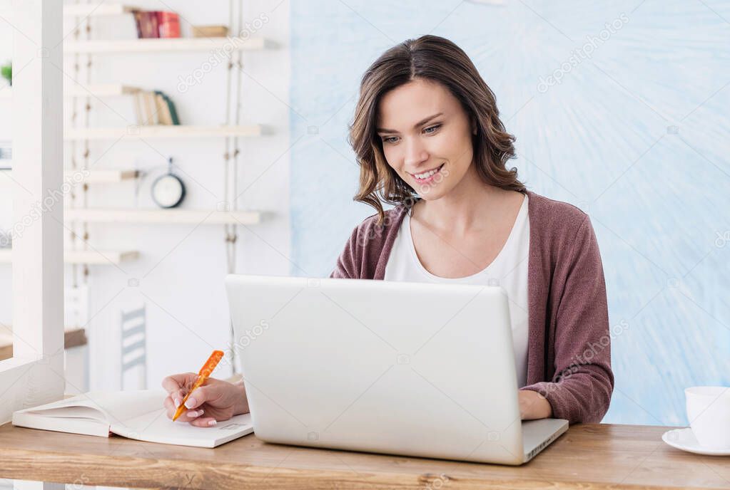 Young beautiful woman using laptop  computer in office 