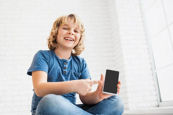 Happy Cute Boy Showing Smartphone — Stock Photo, Image