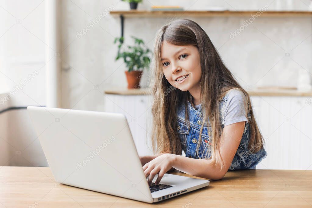 beautiful cute girl using laptop computer