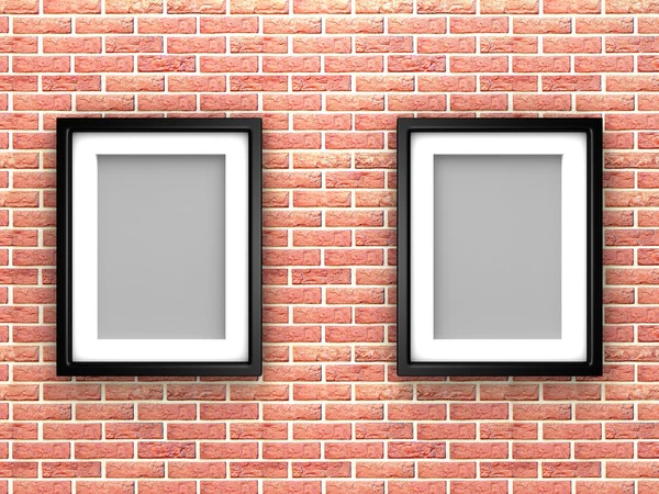 Blank photo frames on brick wall — Stock Photo, Image