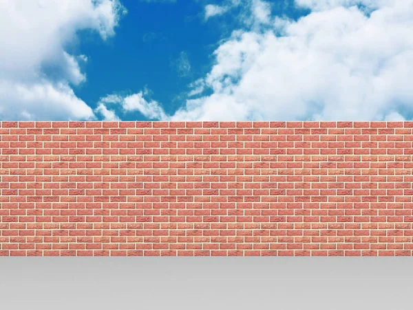 High brick wall on blue cloudy sky — Stock Photo, Image