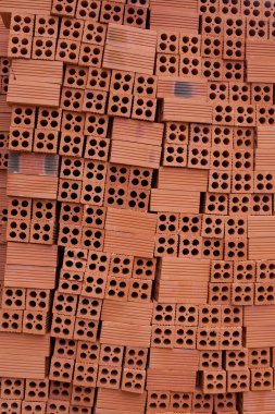 Kırmızı tuğla yapımı için dikey düzensiz akışı