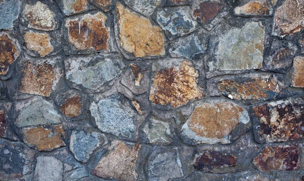 Fragment av gamla stenmuren närbild — Stockfoto