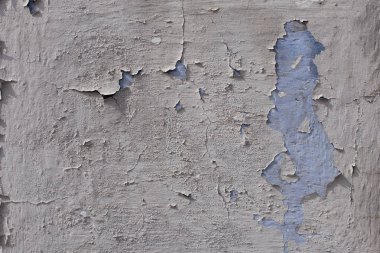 Daraltılmış sıva ile mavi boyalı duvar