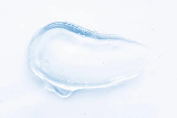 Mancha Crema Gel Líquido Transparente Sobre Fondo Blanco Cosmética Azul —  Fotos de Stock