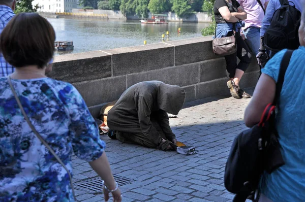 One of the many ways to take money from tourists on Charles Bridge