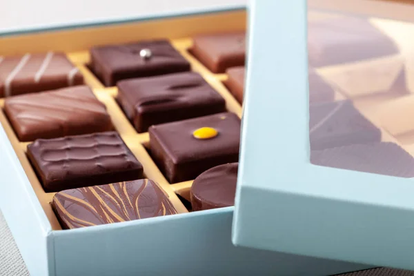 Natural chocolate candies in a beautiful cardboard box.