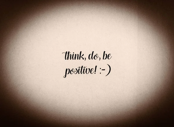 Be positive phrase written in black and white