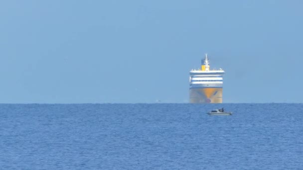 Little boat with big ship coming — Stock Video