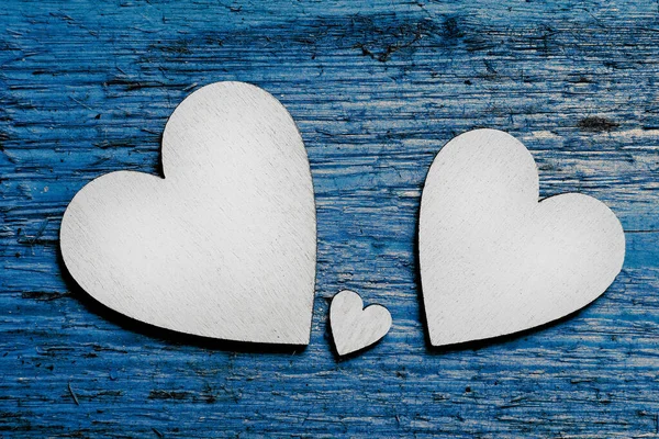 Two Big Silver Wooden Hearts One Small Heart Them Blue — Stock Photo, Image