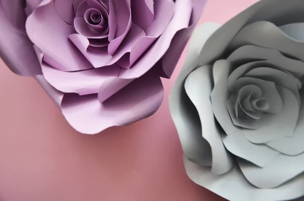 Colourful handmade paper flowers on pink background. Vintage paper flowers. Ultra Violet, Grey,  flowers paper background pattern lovely style. Rose made from paper.