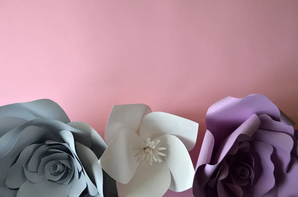 flowers background. Colourful handmade paper flowers on pink background. Vintage paper flowers. Ultra Violet, Grey, flowers paper background pattern lovely style. Rose made from paper. Happy womans da